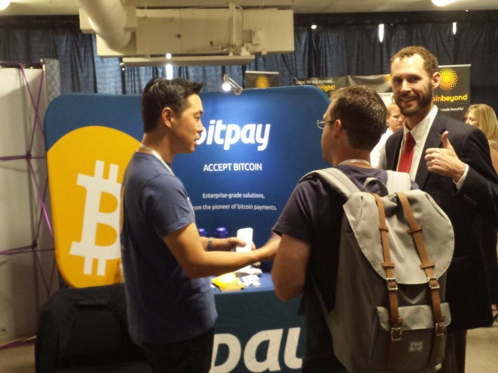 Job seekers visit the Bit Pay booth at Bitcoin Job Fair in California. Image Credit: @Bitpay